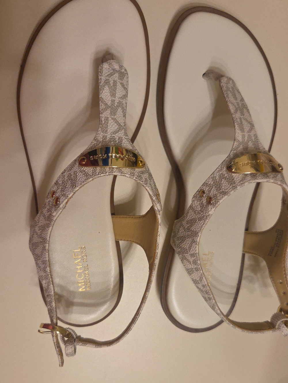 MICHAEL Michael Kors Ivory/Beige Logo Thong Sandals with Gold Plate